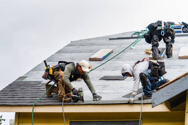 Professional Roofing technician working in Brightwood, OR